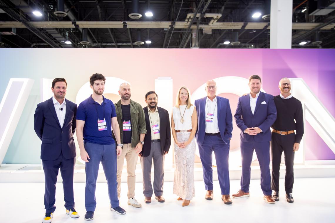 Kelin Kushin on stage at Vision Expo West 2025 with other finalists of the VSP Innovation Challenge